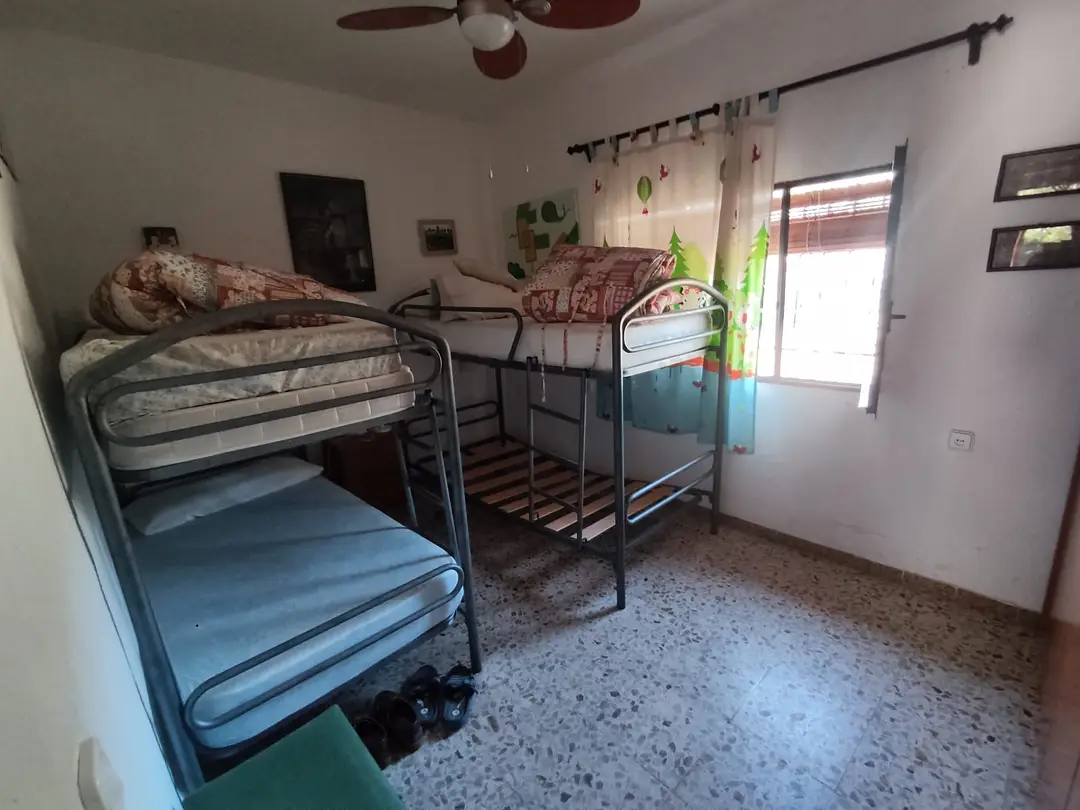 Dormitorio con literas – Venta de Parcelas en Córdoba