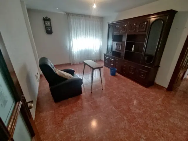 Salón con mueble de madera – Piso Venta Pasaje Cristo Del Amor