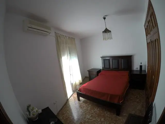 Dormitorio con aire acondicionado – Casa en Venta en Almodóvar del Río